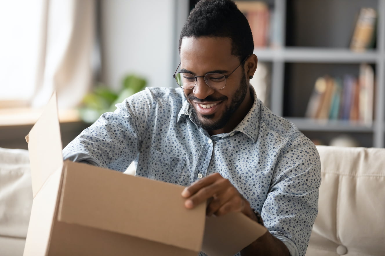Man opening a package