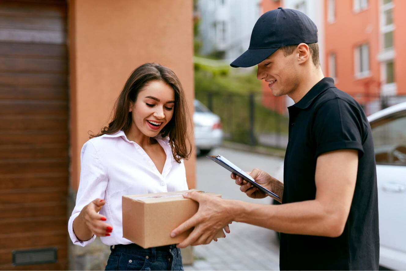 Person Handing Another Person a Package